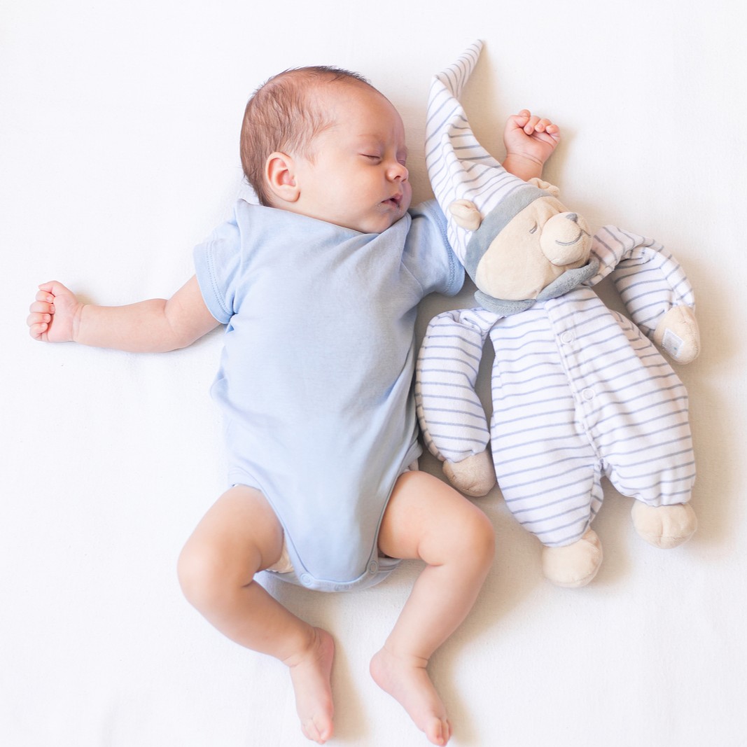 bigstock-The-Baby-Is-Lying-In-A-Crib-Wi-454499245